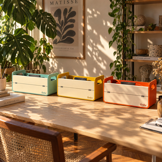Gustav Original Limited Edition in Teal, Mustard and Brick on an oak desk