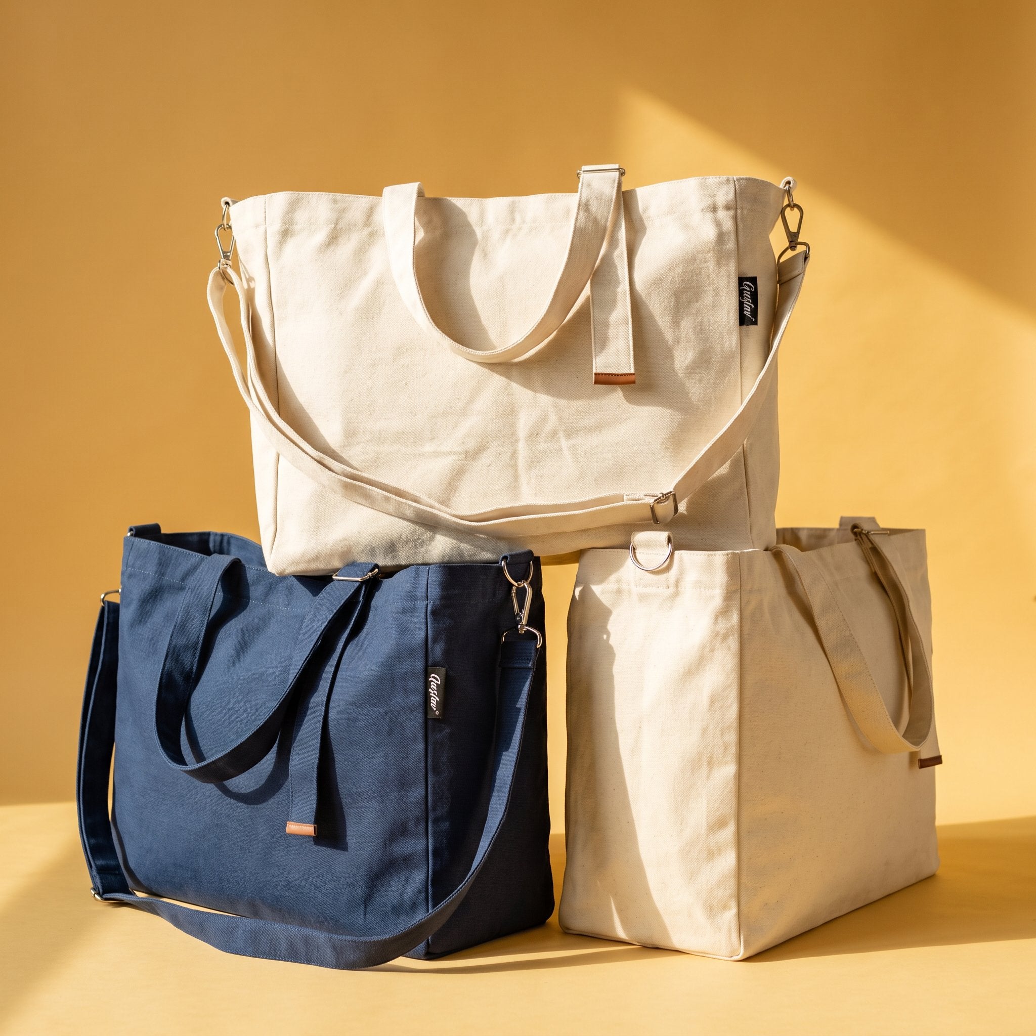 Gustav Carryall tote bags in natural and navy canvas